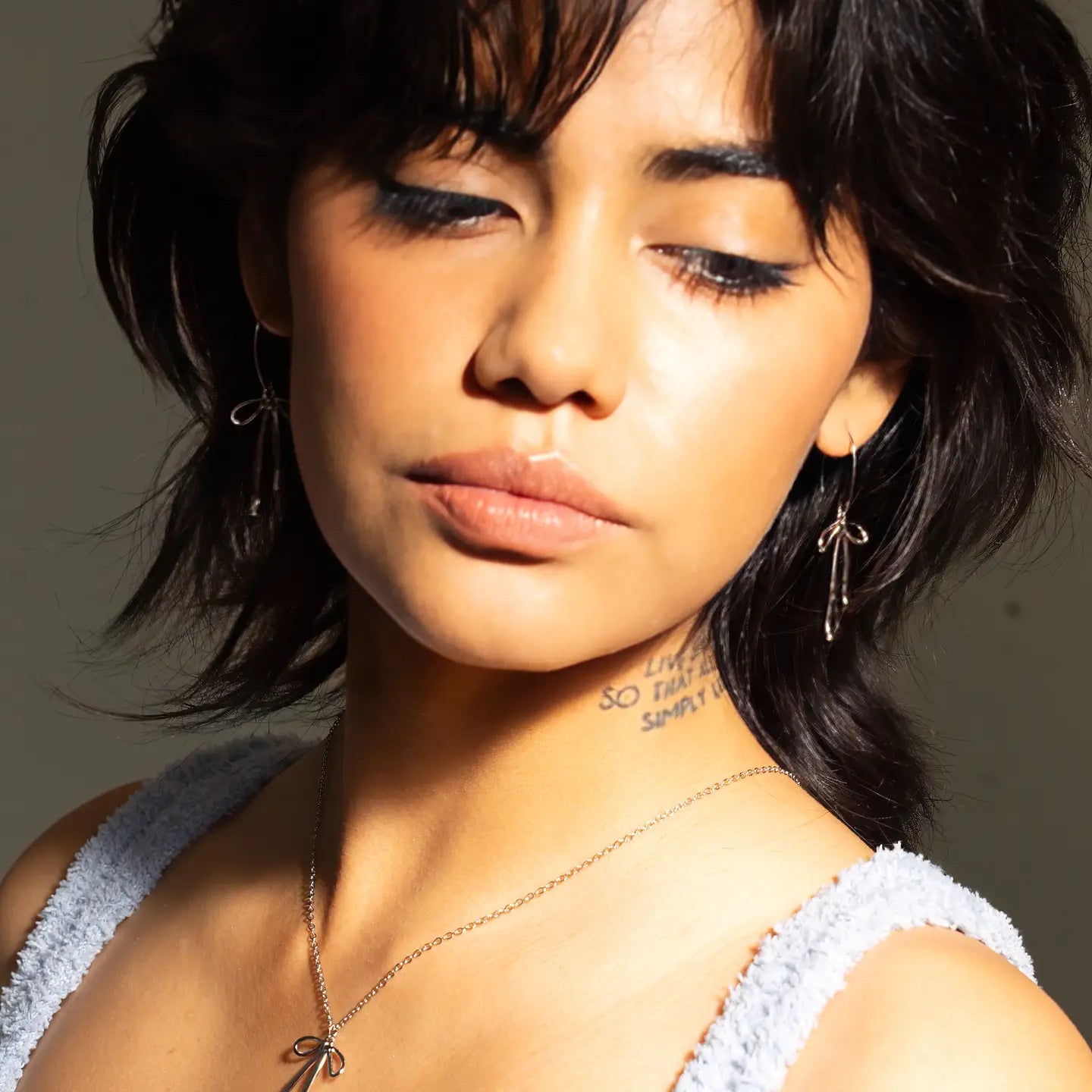 Silver Bad To the Bow Earrings