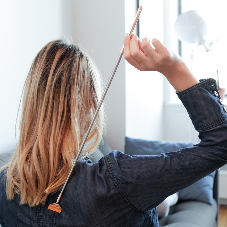 Copper back scratcher