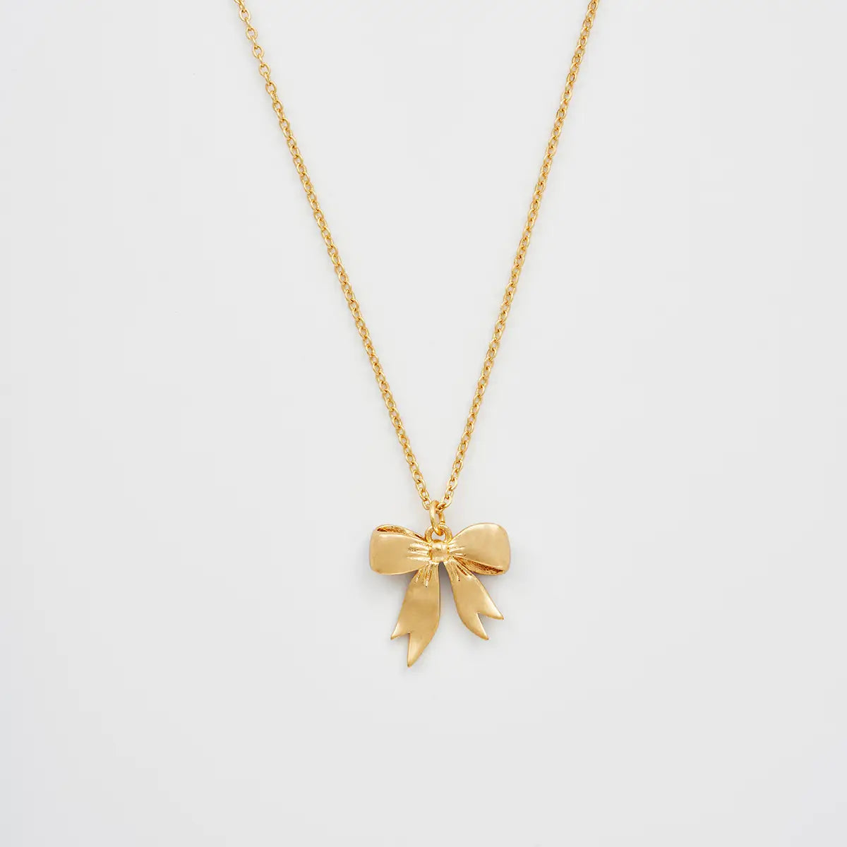 Bow Pendant Necklace by Fable England
