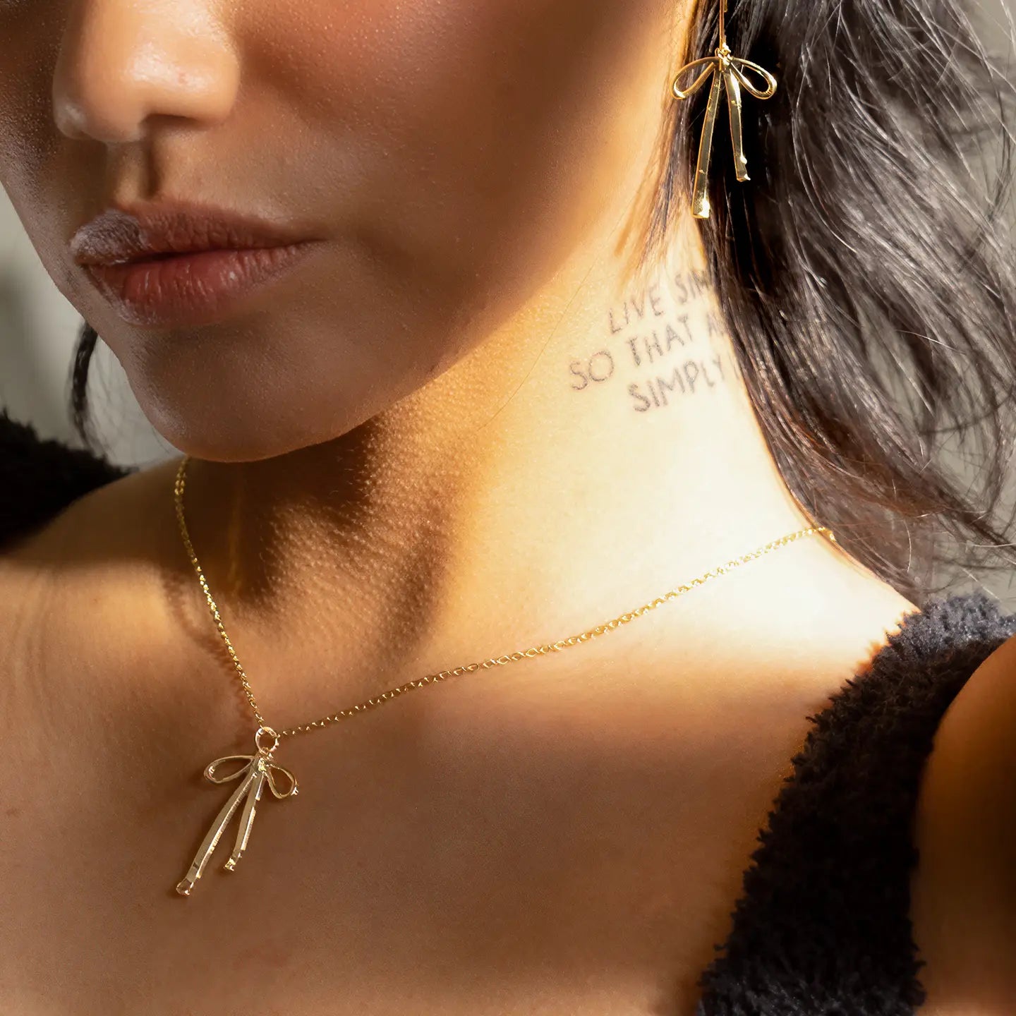 Gold Bad To the Bow Necklace