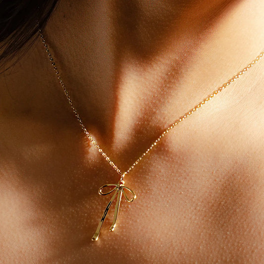 Gold Bad To the Bow Necklace