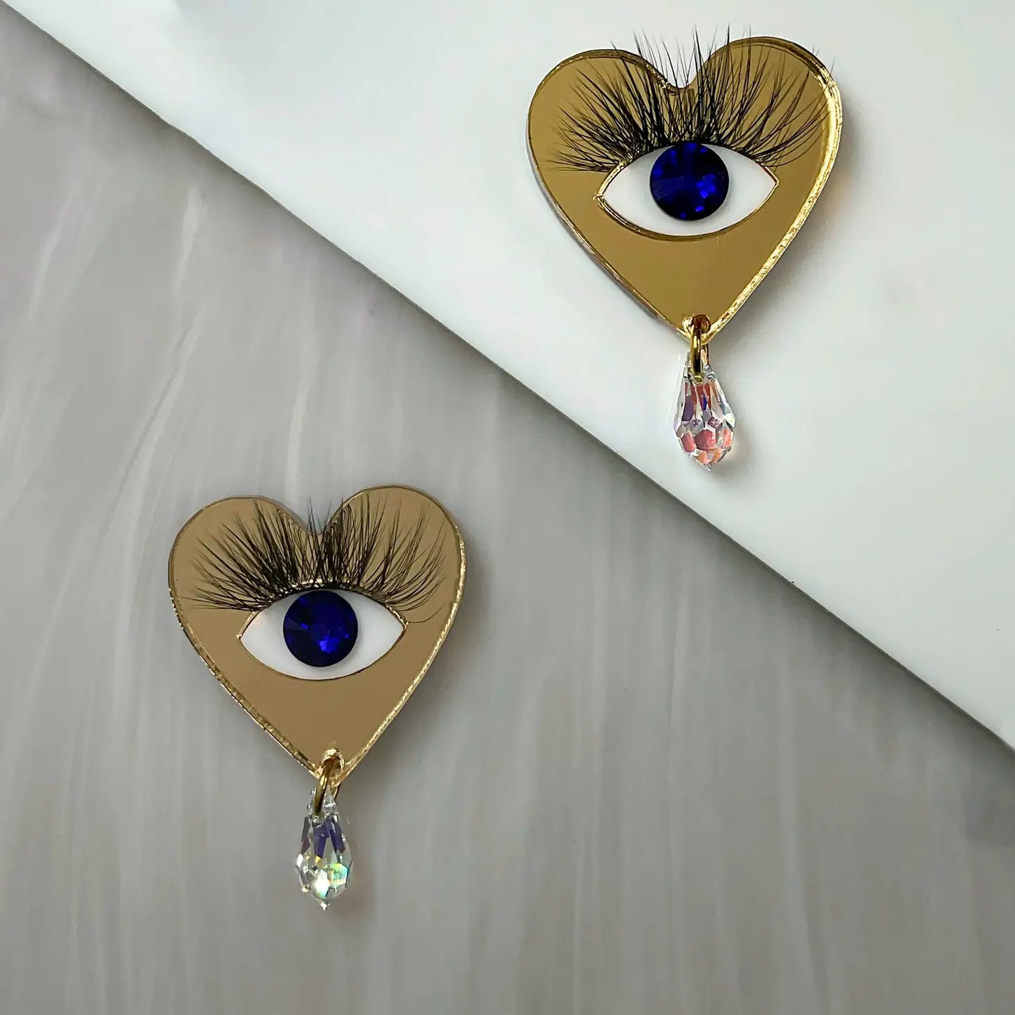 Love Never Eyes Earrings in Gold