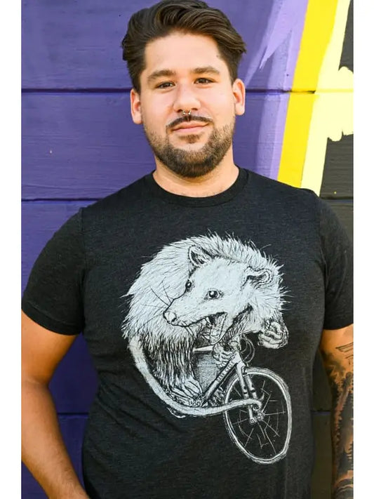 Opossum On A Bicycle